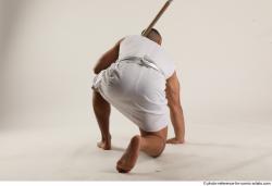 ATILLA KNEELING POSE WITH SPEAR